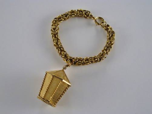 Trifari vintage  bracelet gold gilt chain with lantern & Triege, 1960`s ca, American